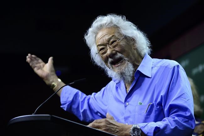 Environmentalist David Suzuki joins Green Party Leader Elizabeth May during a press conference on Parliament Hill in Ottawa on Friday, June 14, 2019. Two leading Canadian activists say voters need to look at climate change in the upcoming federal election as if we are country at war against greenhouse gas emissions. THE CANADIAN PRESS/Sean Kilpatrick