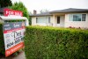 A real estate sign is pictured in Vancouver, B.C., Tuesday, June, 12, 2018. THE CANADIAN PRESS Jonathan Hayward