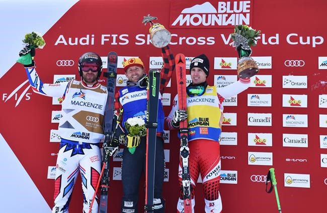 Brady Leman of Canada, centre, celebrates his victory with second place finisher Bastien Midol of France, left, and third place finisher Johannes Rohrweck of Austria at an FIS World Cup skicross event in Blue Mountain, Ont. on Saturday, January 26, 2019. THE CANADIAN PRESS/HO, Michael Colligan, Alpine Canada *MANDATORY CREDIT*