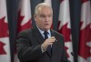 Conservative MP Erin O'Toole speaks during a news conference, Wednesday October 11, 2017 in Ottawa. Several Conservative officials are arguing that new electoral laws should not apply retroactively, after they were required to return the proceeds from two fundraising events held earlier this year. The Tory electoral district associations in Mississauga—Streetsville and Durham returned to donors funds connected to two events in January, one attended by Conservative Deputy Leader Lisa Raitt and the other by foreign affairs critic Erin O'Toole. THE CANADIAN PRESS/Adrian Wyld