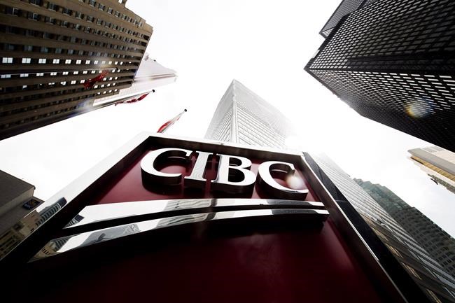 A CIBC sign is shown in the financial district in Toronto on August 22, 2017. THE CANADIAN PRESS/Nathan Denette