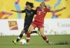Canada's Rebecca Quinn (6) and Mexico's Monica Ocampo (11) battle for the ball during the first half of the 2015 Pan Am Games women's bronze medal soccer match in Hamilton, Ontario on Friday, July 24, 2015. Defensive midfielder Rebecca Quinn has signed with Paris FC, becoming the latest Canadian international to opt to play in Europe. THE CANADIAN PRESS/Peter Power