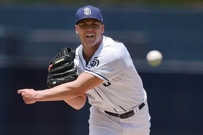 San Diego Padres starting pitcher Clayton Richard pitches to San Francisco Giants' Evan Longoria during the first inning of a baseball game in San Diego, Tuesday, July 31, 2018. The injury-depleted Toronto Blue Jays' rotation got a boost Thursday with the reinstatement of left-hander Clayton Richard from the 10-day injured list. THE CANADIAN PRESS/AP, Kelvin Kuo