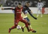 Toronto FC defender Auro (96) battles for the ball with Club America midfielder William Da Silva (7) during first half CONCACAF Champions League semifinal action in Toronto on April 3, 2018. Toronto FC made versatile Brazilian Auro a permanent member of its squad Monday while, looking farther to the future, signing 14-year-old forward Jahkeele Marshall-Rutty to a USL contract. The MLS team exercised its option to buy the 22-year-old Auro, whose full name is Auro Alvaro da Cruz Junior, from Brazilian club Sao Paulo FC. THE CANADIAN PRESS/Nathan Denette