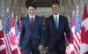 U.S. President Barack Obama and Prime Minister Justin Trudeau walk down the Hall of Honour on Parliament Hill, in Ottawa, June 29, 2016. In a message on Twitter, Obama says the world needs progressive leadership and he hopes Canadians will give Trudeau another term as prime minister. THE CANADIAN PRESS/Paul Chiasson