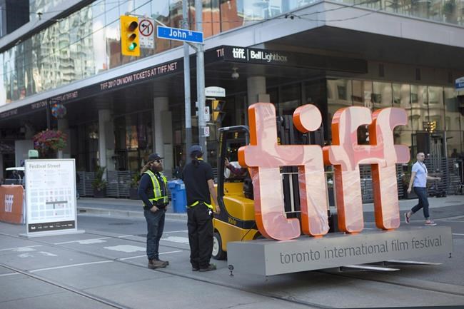 A sign bearing the Toronto International Film Festival logo sits on a fork lift as preparations are made for the festival's opening night on Thursday September 7, 2017. Netflix is putting its support behind the next generation of filmmakers under a partnership with the Toronto International Film Festival. THE CANADIAN PRESS/Chris Young