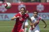 Canada's Christine Sinclair (left) and Costa Rica's Shirley Cruz chase a through ball during first half international women's soccer action in Toronto on Sunday, June 11, 2017. Captain Christine Sinclair rescued Canada with an 81st-minute penalty in a 1-0 win over Scotland at the Algarve Cup on Friday. THE CANADIAN PRESS/Chris Young