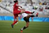 Former Canadian international Rhian Wilkinson has been appointed head coach of the Canadian women's under-17 and under-20 soccer teams. Canada's Rhian Wilkinson, left, and Germany's Anja Mittag vie for the ball during a semi-final match of the women's Olympic football tournament in Belo Horizonte, Brazil, Tuesday Aug. 16, 2016. THE CANADIAN PRESS/AP-Eugenio Savio