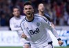 Vancouver Whitecaps' Pedro Morales, of Chile, celebrates after scoring a goal on a penalty kick during the second half of an MLS soccer game against New York City FC in Vancouver, B.C., on Saturday September 26, 2015. The Whitecaps will be without injured captain Morales for a while.Head coach Carl Robinson said after Tuesday's training session that the Chilean midfielder was waiting for the results of an MRI scan on his groin.THE CANADIAN PRESS/Darryl Dyck