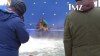 A dog appears to be forced into turbulent water during the filming of 