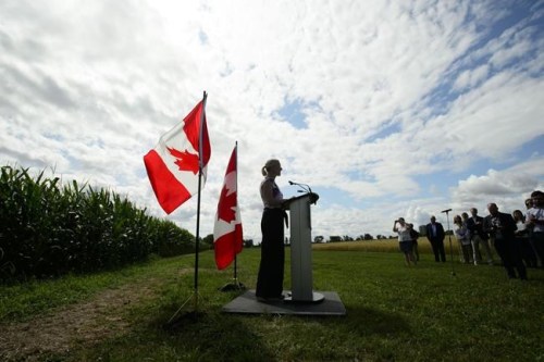 Environment Minister Catherine McKenna announces support for Canada's agricultural sector during a press conference at the Central Experimental Farm in Ottawa on Friday, Aug. 9, 2019. Conservative Leader Andrew Scheer and NDP Leader Jagmeet Singh poured cold water Tuesday on the new Liberal commitment to combat climate change by achieving net zero carbon emissions by 2050. THE CANADIAN PRESS/Sean Kilpatrick
