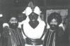 This April, 2001 photo which appeared in a newsletter from the West Point Grey Academy, shows a costumed Prime Minister Justin Trudeau, his face and hands darkened by makeup, attending a 
