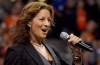 Canadian singer Sarah McLachlan sings the national anthem at B.C. Place stadium in Vancouver, B.C., on September 30, 2011. McLachlan, a proud soccer mom herself, will help kick off the Women's World Cup on Saturday. THE CANADIAN PRESS/Darryl Dyck