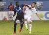 Montreal Impact's Bacary Sagna, left, challenges Real Salt Lake's Sebastian Saucedo during second half MLS soccer action in Montreal, Wednesday May 29, 2019. Former Arsenal player Sagna knows a thing or two about important derby games and what they mean for fans. Now he's preparing for another big rivalry game as Montreal hosts Toronto on Saturday. THE CANADIAN PRESS/Graham Hughes