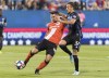 Montreal Impact's Maximiliano Urruti, right, challenges Cavalry FC's Jonathan Wheeldon during first half semifinal Canadian Championship soccer action in Montreal, on August 7, 2019. Cavalry FC, the Calgary-based CPL club, looks to defeat its second straight MLS team when it hosts the Montreal Impact on Wednesday in the second leg of their Canadian soccer championship semifinal. THE CANADIAN PRESS/Graham Hughes