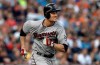 In this Aug. 21, 2013, file photo, Minnesota Twins' Justin Morneau runs after hitting a double against the Detroit Tigers in the third inning of a baseball game in Detroit. Former American League most valuable player Morneau and 2016 AL all-star Michael Saunders highlight Canada's roster for the WBSC Premier 12 next month. THE CANADIAN PRESS/AP/Paul Sancya, File