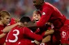 Canada's captain Kevin McKenna (centre) celebrates with Julian DeGuzman (right) Atiba Hutchinson (13) and Andre Hainault (left) after Dwayne DeRosario (hidden) scores against Panama during second half action in 2014 World Cup Qualifier, in Toronto on Friday, September 7, 2012. Former Canada captain Kevin McKenna and Randee Hermus have been named to the Canada Soccer Hall of Fame. THE CANADIAN PRESS/Chris Young