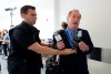 A member of the RCMP removes David Menzies, a reporter from Rebel Media, during a campaign stop for Conservative leader Andrew Scheer at the Abilities Centre in Whitby, Ont. Monday, September 30, 2019. Two right-wing media organizations are turning to the courts after they say their representatives were denied accreditation to cover tonight's election debate. THE CANADIAN PRESS/Jonathan Hayward