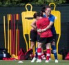 Canada goalkeeper Erin McLeod, back, jokes with Diana Matheson during a FIFA Women's World Cup soccer practice session in Vancouver, B.C., on June 24, 2015. Veterans Diana Matheson and Erin McLeod return to the Canadian lineup for the Algarve Cup later this month. Both players were not summoned for last month's camp in Spain and friendly win over Norway as a precaution after rehabbing injuries. While both have suffered long-term knee injuries in the past, Matheson had been sidelined by a toe issue while McLeod was dealing with a foot problem. Matheson, a 34-year-old midfielder from Oakville, Ont., has 201 caps for Canada. The 35-year-old McLeod, a goalkeeper from St. Albert, Alta., has 116 caps. THE CANADIAN PRESS/Darryl Dyck