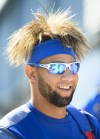 Toronto Blue Jays infielder Lourdes Gurriel Jr. arrives off the bus during baseball spring training in Dunedin, Fla. on Tuesday, February 19, 2019. Gurriel Jr. strums his bat like a guitar as music blares from the loud speakers while he awaits his turn during batting practice.When the Backstreet Boys hit 