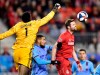 Toronto FC defender Drew Moor (3, New York City defender Alexander Callens (6) and New York City goalkeeper Sean Johnson (1) battle in the air during first half MLS action in Toronto on March 29, 2019. THE CANADIAN PRESS/Frank Gunn