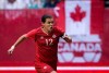 Canada's Christine Sinclair chases down the ball during the first half of an international women's soccer game against Germany in Vancouver, B.C., on Wednesday June 18, 2014. Corruption allegations against senior FIFA officials have put sponsors of the upcoming Women's World Cup in Canada in a tight spot, says a sports marketing expert. THE CANADIAN PRESS/Darryl Dyck