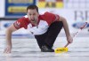 Team Newfoundland and Labrador skip Brad Gushue reacts as his shot enters the house during the gold medal game against Team Alberta at the Brier curling championship Sunday March 13, 2016 in Ottawa. Gushue is brimming with cautious optimism as he weighs in on when his injured left hip might be ready for him to return to the ice. THE CANADIAN PRESS/Adrian Wyld