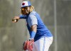 Toronto Blue Jays infielder Vladimir Guerrero Jr. (27) makes a throw to first base in a drill during baseball spring training in Dunedin, Fla., on Tuesday, February 19, 2019. The Toronto Blue Jays have called up Guerrero Jr. and say he will make his highly anticipated major-league debut Friday against the visiting Oakland Athletics. THE CANADIAN PRESS/Nathan Denette