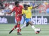 Brazil's Ludmila, right, protects the ball from Canada's Kadeisha Buchanan during first half soccer action in Ottawa on Sunday, Sept. 2, 2018. Canada will be without defensive linchpin Kadeisha Buchanan for its May 18 friendly with Mexico at Toronto's BMO Field. THE CANADIAN PRESS/Adrian Wyld
