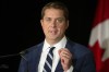 Conservative party Leader Andrew Scheer says if elected his government would create a certification system to let consumers know if certain digital products meet federal safety standards. Scheer addresses journalists during a news conference in Toronto, on Thursday, Aug. 29, 2019. THE CANADIAN PRESS/Chris Young