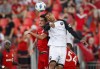 Toronto FC's Jay Chapman, left, battles for the ball with Ottawa Fury FC's Steevan Dos Santos during the first half of Canadian Championship soccer action in Toronto on July 25, 2018. The Canadian Championship will expand to 13 teams in 2019 with the addition of seven Canadian Premier League clubs. THE CANADIAN PRESS/Mark Blinch