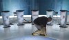 A technician cleans the set in preparation for a leaders debate, Wednesday, September 23, 2015 in Montreal. Leaders of five major parties have received invitations to participate in federal leaders' debates in October, with the People's Party of Canada left out for now.THE CANADIAN PRESS/Paul Chiasson