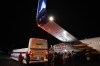 Members of the media inspect the wing from Liberal Leader Justin Trudeau's campaign plane after being struck by the media bus following landing in Victoria, B.C., on Wednesday, Sept.11, 2019. Justin Trudeau's federal election campaign was forced to get a new plane after the Liberal party's chartered aircraft was damaged Wednesday night in a minor collision with a bus at the Victoria airport. THE CANADIAN PRESS/Sean Kilpatrick