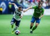 Vancouver Whitecaps' Lucas Venuto (7) plays the ball against Seattle Sounders' Brad Smith (11) during the second half MLS soccer action in Vancouver, B.C., on Saturday March 30, 2019. Last week, the Whitecaps earned their first point of the Major League Soccer season with a scoreless draw. Now the group is looking for their first victory and their next opportunity for a win will come Friday, when the 'Caps (0-3-1) host the L.A. Galaxy (3-1-0). THE CANADIAN PRESS/Ben Nelms