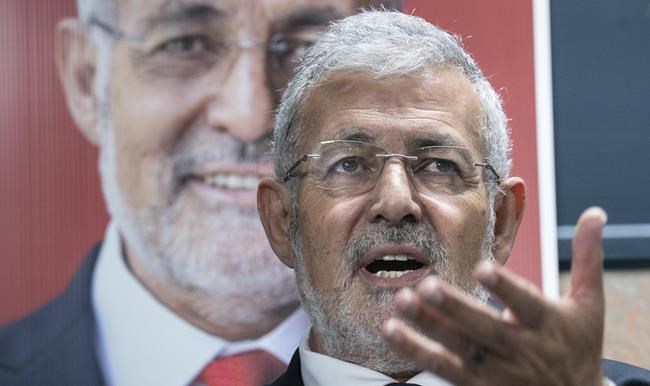 The past comments of political candidates, be they from years ago, days ago, secret or well-known, have been causing some bumps along the campaign trail, forcing party leaders to contend with social media posts surfacing in these early days. Imam Hassan Guillet, who has been dropped by the Liberal party as a candidate, responds to a question during a news conference in Montreal on Wednesday, Sept. 4, 2019. THE CANADIAN PRESS/Paul Chiasson