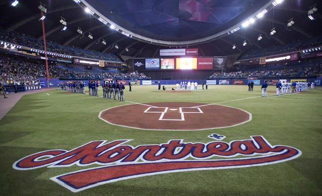 The Toronto Blue Jays and New York Mets are shown on the Olympic Stadium field in Montreal ahead of an interleague MLB spring training baseball game in Montreal on March 28, 2014.The Tampa Bay Rays have received permission from Major League Baseball's executive council to explore a plan that could see the team split its home games between the Tampa Bay area and Montreal. THE CANADIAN PRESS/Paul Chiasson