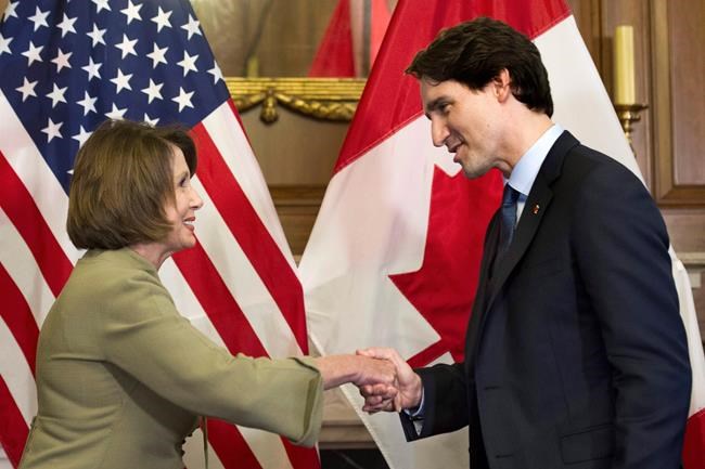 Canadian Prime Minister Justin Trudeau shakes hands with House Minority Leader Nancy Pelosi of Calif. prior to their meeting on Capitol Hill in Washington, Thursday, March 10, 2016. Justin Trudeau and U.S. House Speaker Nancy Pelosi are placing a bet on the NBA Finals, with the prime minister putting bagels and beer up against wine and chocolate. THE CANADIAN PRESS/AP, Cliff Owen