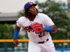 Buffalo Bisons' Vladimir Guerrero Jr. chases a foul ball hit by a Lehigh Valley IronPigs batter during the first inning of his Triple-A debut with the affiliate of the Toronto Blue Jays on Tuesday, July 31, 2018, in Buffalo N.Y. There's one rookie slugger everyone wants to see at Blue Jays spring training this year, even though no one expects him to crack the opening day lineup.Still, it won't be long before Vladimir Guerrero Jr. and his booming bat become lineup fixtures for the rebuilding Blue Jays.THE CANADIAN PRESS/AP/Jeffrey T. Barnes