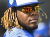 Toronto Blue Jays infielder Vladimir Guerrero Jr. (27) looks on at practice during baseball spring training in Dunedin, Fla., on Monday, February 18, 2019. The Toronto Blue Jays aren't putting a timeline on top prospect Vladimir Guerrero Jr.'s major-league arrival one day after his impressive season debut at triple-A on Thursday night. THE CANADIAN PRESS/Nathan Denette