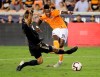 Houston Dynamo's Romell Quioto takes a shot against Philadelphia Union's Jack Elliott during the second half of the U.S. Open Cup championship soccer match in Houston, Wednesday, Sept. 26, 2018. THE CANADIAN PRESS/AP-David J. Phillip