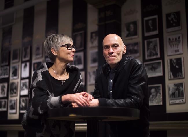 Jill Daum and her husband John Mann, lead singer of Spirit of the West, pose for a photograph in Toronto on Friday, April 29, 2016. Mann, who was diagnosed with Alzheimer's disease at the age of 52, died Wednesday. THE CANADIAN PRESS/Nathan Denette