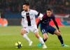 Toronto FC has signed French winger Nicolas Benezet. Guingamp's Nicolas Benezet, left, duels for the ball with PSG's Angel Di Maria during the French League One soccer match between Paris Saint Germain and Guingamp at the Parc des Princes stadium in Paris, Sunday, April 29, 2018. THE CANADIAN PRESS/AP-Thibault Camus