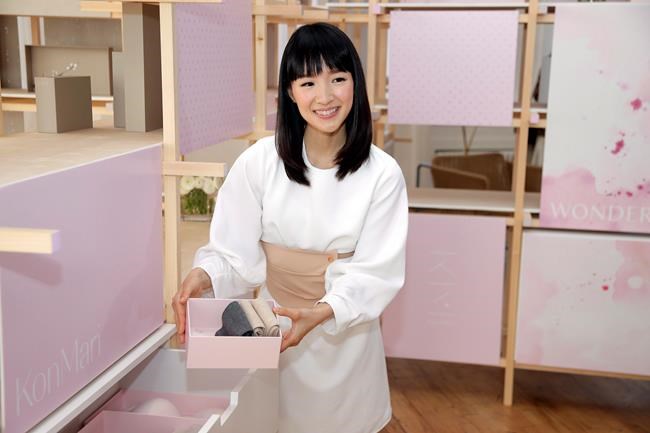 Japanese organizational expert Marie Kondo introduces her new line of storage boxes during a media event in New York on July 11, 2018. Are the volumes crowding your bookshelves classics or clutter? It's a question raised by tidying guru Marie Kondo that's spurred bibliophilic uproar online. THE CANADIAN PRESS/AP, Seth Wenig