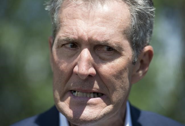 Manitoba Premier Brian Pallister reacts as he speaks to the media during a meeting of Premiers and Indigenous Leaders in Big River, First Nation, Sask, on July, 9, 2019. Premier Brian Pallister says death taxes will end if a Progressive Conservative government is elected in the upcoming provincial election. THE CANADIAN PRESS/Jonathan Hayward