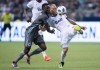 Vancouver Whitecaps' Marcel de Jong, right, kicks the ball away from Minnesota United's Abu Danladi during the second half of an MLS soccer game in Vancouver on July 28, 2018. The Vancouver Whitecaps have parted ways with veteran Canadian defender Marcel de Jong. The Major League Soccer club announced the move in a statement Monday, saying it 