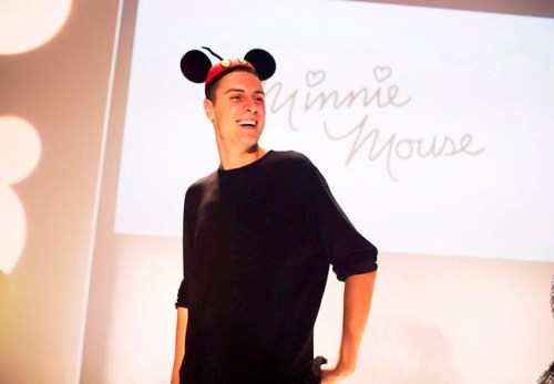 Finalist Sid Neigum is crowned with mouse ears after winning the Mercedez-Benz Start Up program where finalists created designs inspired by Minnie Mouse at World MasterCard Fashion Week in Toronto on Tuesday, October 21, 2014. Neigum has won big at the Canadian Arts and Fashion Awards. The Alberta-born, Toronto-based designer was crowned womenswear designer of the year and won a $20,000 grant at an annual bash in Toronto.THE CANADIAN PRESS/Michelle Siu