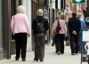 Senior citizens make their way down the a main street in Peterborough, Ontario on Monday May 7, 2012. THE CANADIAN PRESS/Frank Gunn