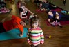 Two-year-old Marena Ewanowich stands amongst exercisers during a Fit Mommy exercise class on Thursday, May 3, 2012 in Edmonton, Alta. More Canadians, it seems, are changing dirty diapers, serving up spoonfuls of mushy peas and getting tongue-tied over Dr. Seuss books before bed, if the latest census figures from Statistics Canada are any indication. THE CANADIAN PRESS/Jason Franson