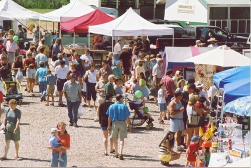People shop at various vendors at the Millarville farmers' market South of Calgary in this undated handout photo. THE CANADIAN PRESS/HO, Alberta Agriculture and Forestry *MANDATORY CREDIT*