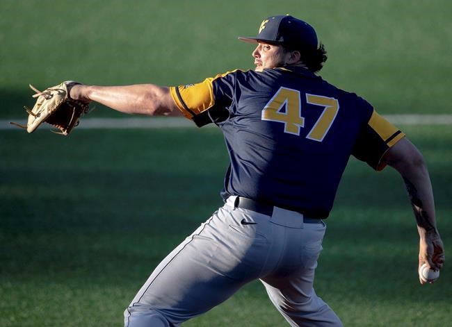 West Virginia pitcher Alek Manoah throws against Texas during an NCAA college baseball game Friday, April 26, 2019, in Austin, Texas.Manoah used to go to bed each night thinking about how it would feel to hear his name called at the MLB draft. THE CANADIAN PRESS/AP-Nick Wagner/Austin American-Statesman via AP